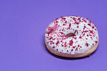 Image showing Macro shoot of donut on blue