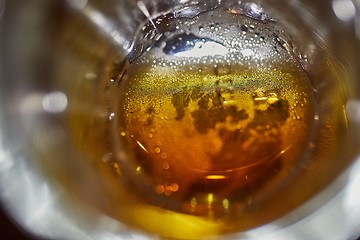 Image showing Drinking beer closeup inside the pint glass