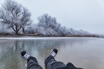 Image showing Skating on a lake