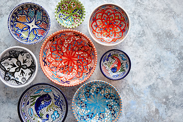 Image showing Collection of empty moroccan colorful decorative ceramic bowls