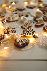 Image showing Christmas sweets composition. Gingerbread cookies with xmas decorations