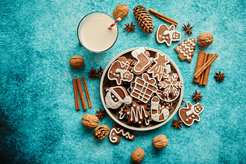 Image showing Sweet Christmas composition. Assortment of gingerbread cookies on a plate