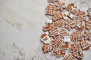 Image showing Assortment of fresh gingerbread Christmas cookies in various shapes