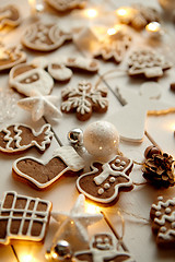 Image showing Christmas sweets composition. Gingerbread cookies with xmas decorations