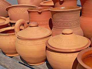 Image showing Orange clay handmade pottery