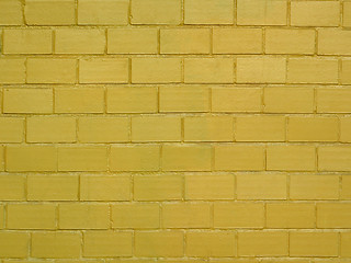 Image showing Brick wall painted in golden color