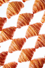 Image showing Diagonal baked goods pattern on a light background.