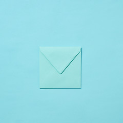 Image showing Blank craft envelope, mock-up on a pastel background.