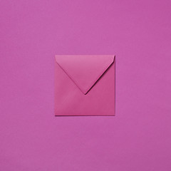 Image showing Craft envelope mock-up for invitation on a magenta background.