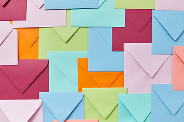 Image showing Background of colorful correspondence craft envelopes.