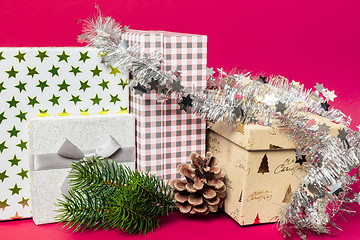 Image showing Christmas decoration gift box with pink background