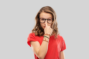 Image showing smiling student girl in glasses and red t-shirt