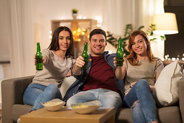 Image showing friends toasting non-alcoholic beer at home