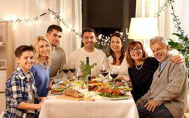 Image showing happy family having dinner party at home