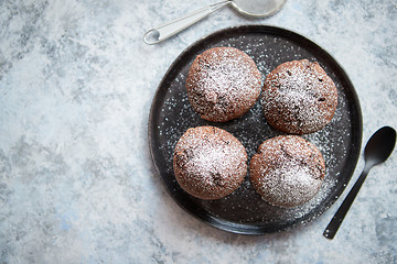 Image showing Fresh and tasty chocolate muffins served on plate