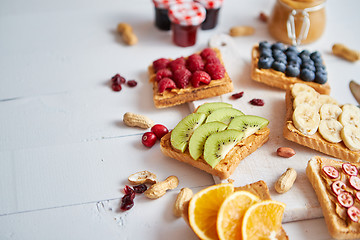 Image showing Assortment of healthy fresh breakfast toasts