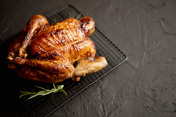 Image showing Homemade baked chicken with rosemary herbs