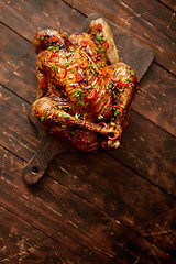 Image showing Homemade roasted spicy chicken with chilli and chive