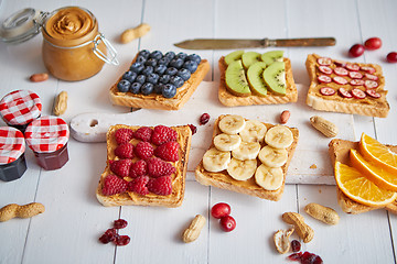 Image showing Assortment of healthy fresh breakfast toasts