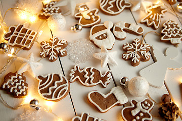 Image showing Christmas sweets composition. Gingerbread cookies with xmas decorations