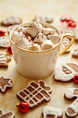 Image showing Cup of hot chocolate and Christmas shaped gingerbread cookies