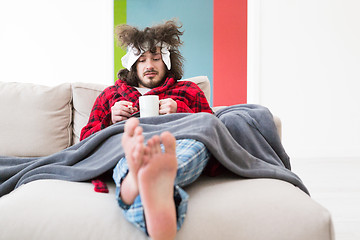 Image showing young Man with flu and fever