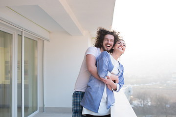 Image showing Couple hugging on the balcony