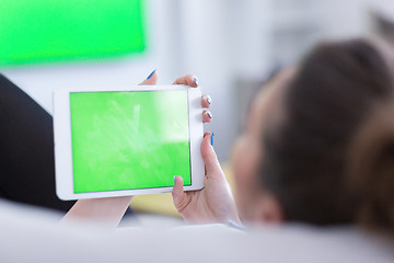 Image showing woman on sofa using tablet computer