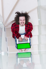 Image showing freelancer in bathrobe working from home