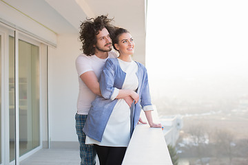 Image showing Couple hugging on the balcony