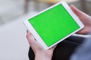 Image showing woman on sofa using tablet computer