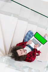 Image showing freelancer in bathrobe working from home