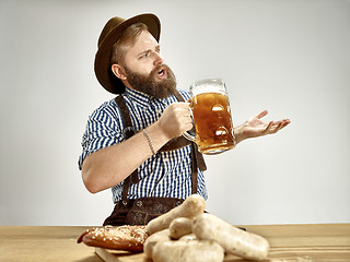 Image showing Germany, Bavaria, Upper Bavaria, man with beer dressed in tradit