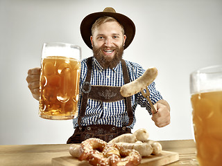 Image showing Germany, Bavaria, Upper Bavaria, man with beer dressed in traditional Austrian or Bavarian costume