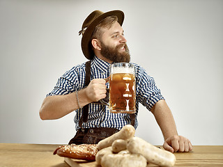 Image showing Germany, Bavaria, Upper Bavaria, man with beer dressed in traditional Austrian or Bavarian costume