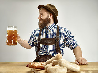 Image showing Germany, Bavaria, Upper Bavaria, man with beer dressed in traditional Austrian or Bavarian costume