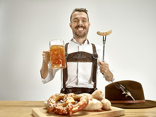 Image showing Germany, Bavaria, Upper Bavaria, man with beer dressed in traditional Austrian or Bavarian costume