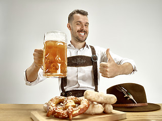 Image showing Germany, Bavaria, Upper Bavaria, man with beer dressed in traditional Austrian or Bavarian costume