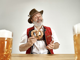 Image showing Germany, Bavaria, Upper Bavaria, man with beer dressed in traditional Austrian or Bavarian costume