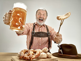 Image showing Germany, Bavaria, Upper Bavaria, man with beer dressed in traditional Austrian or Bavarian costume