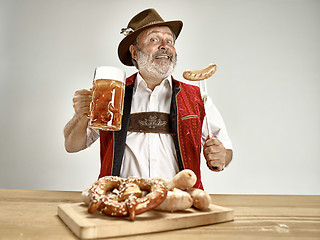 Image showing Germany, Bavaria, Upper Bavaria, man with beer dressed in traditional Austrian or Bavarian costume