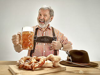 Image showing Germany, Bavaria, Upper Bavaria, man with beer dressed in traditional Austrian or Bavarian costume