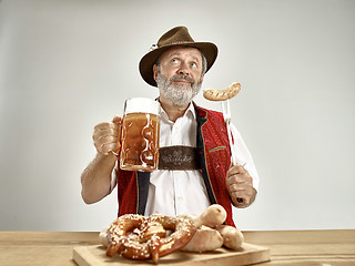 Image showing Germany, Bavaria, Upper Bavaria, man with beer dressed in traditional Austrian or Bavarian costume