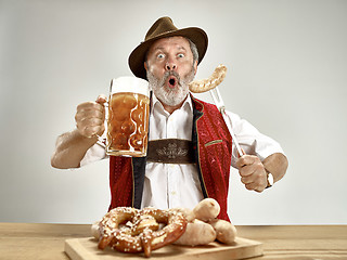 Image showing Germany, Bavaria, Upper Bavaria, man with beer dressed in traditional Austrian or Bavarian costume