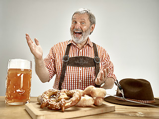 Image showing Germany, Bavaria, Upper Bavaria, man with beer dressed in traditional Austrian or Bavarian costume