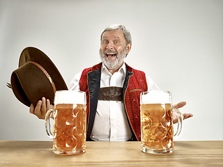 Image showing Germany, Bavaria, Upper Bavaria, man with beer dressed in traditional Austrian or Bavarian costume