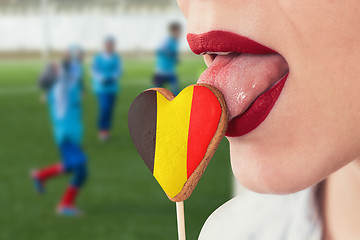 Image showing Lips and cookie with flag