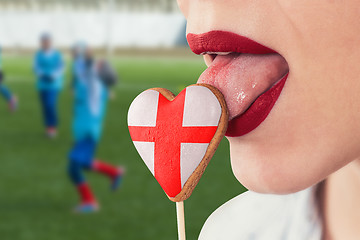 Image showing Lips and cookie with flag