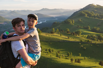Image showing Happy father and son in the Altai mountains