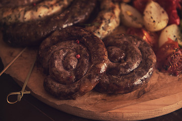 Image showing Grilled sausage with vegetables